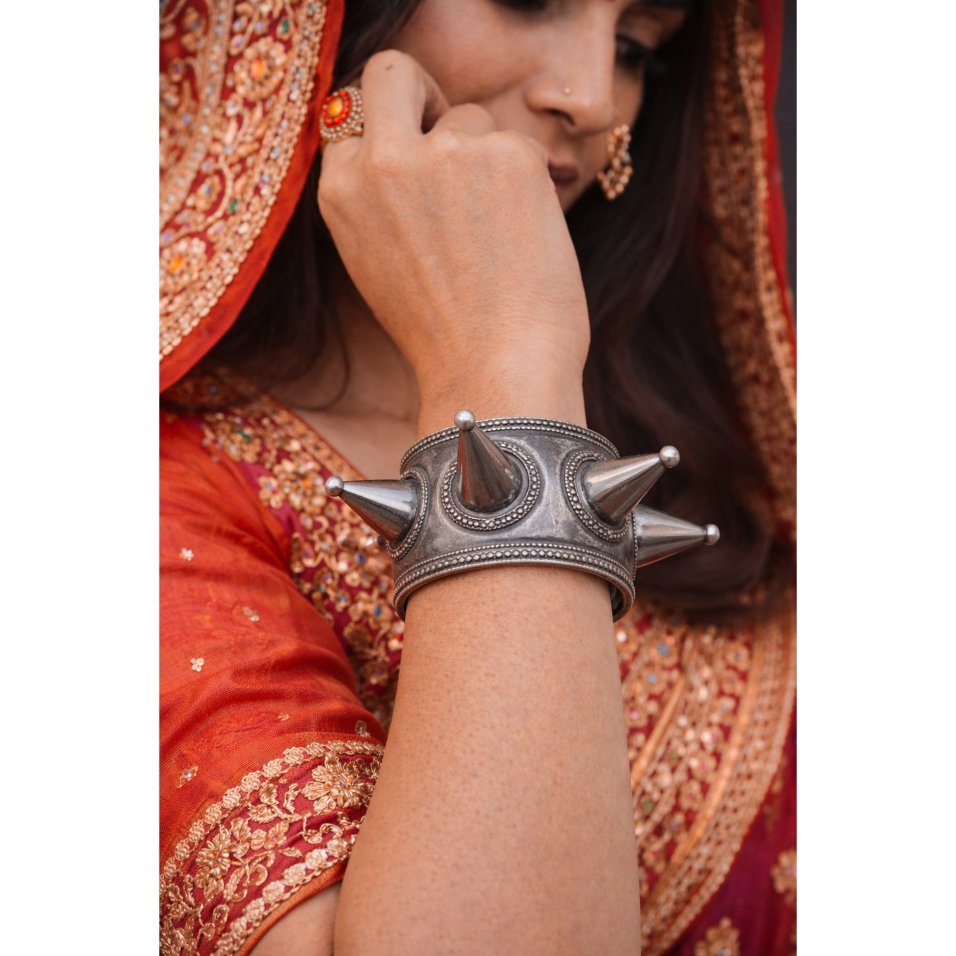 OXIDISED SILVER TRIBAL HAND CUFF WITH CONICAL SPIKES