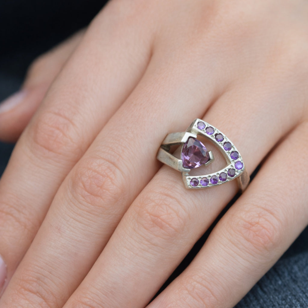 SILVER RING WITH A PEAR CUT AMETHYST & SMALL AMETHYSTS