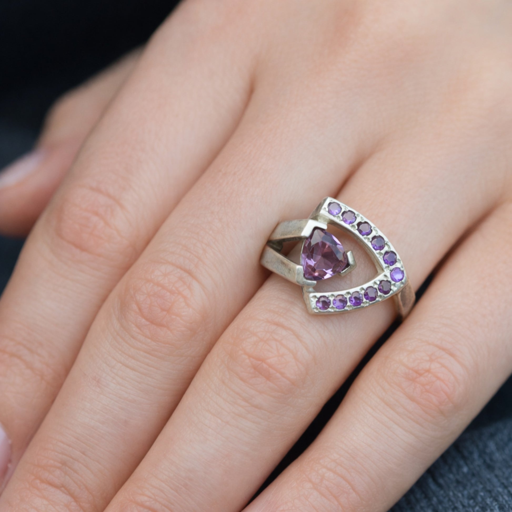 SILVER RING WITH A PEAR CUT AMETHYST & SMALL AMETHYSTS