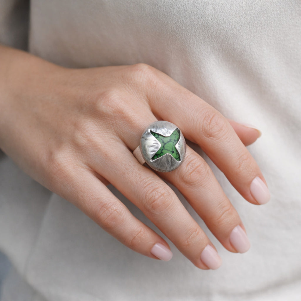 SILVER RING WITH A GREEN STAR SHAPED TURQUOISE