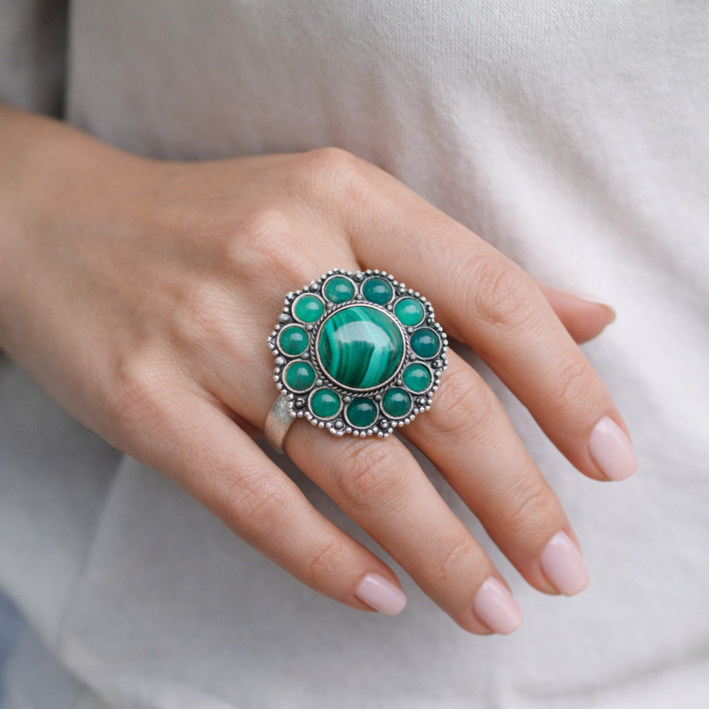 SILVER RING WITH A ROUND MALACHITE STONE