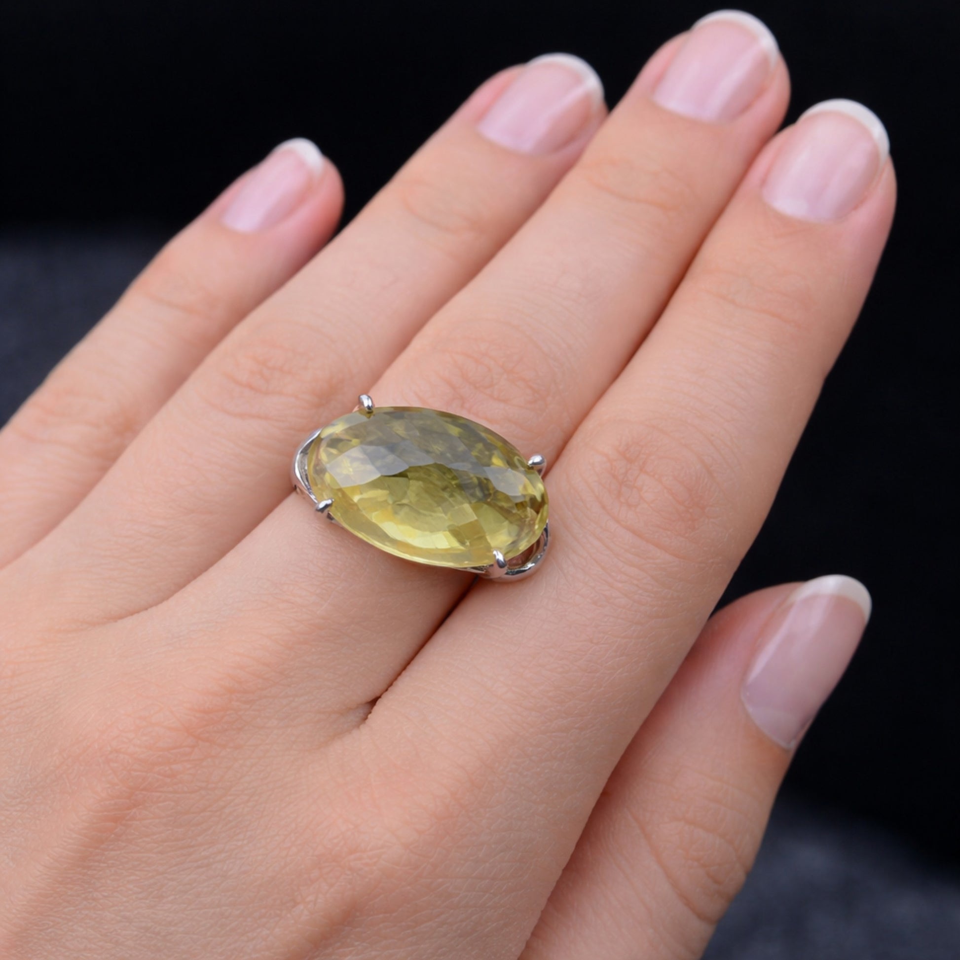 SILVER RING WITH AN OVAL GOLDEN TOPAZ
