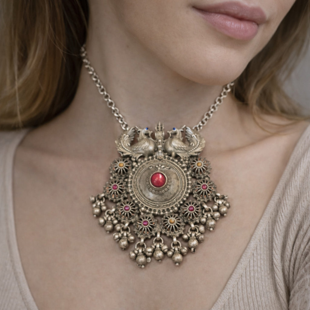 SILVER PENDANT WITH TWIN PEACOCK FIGURES