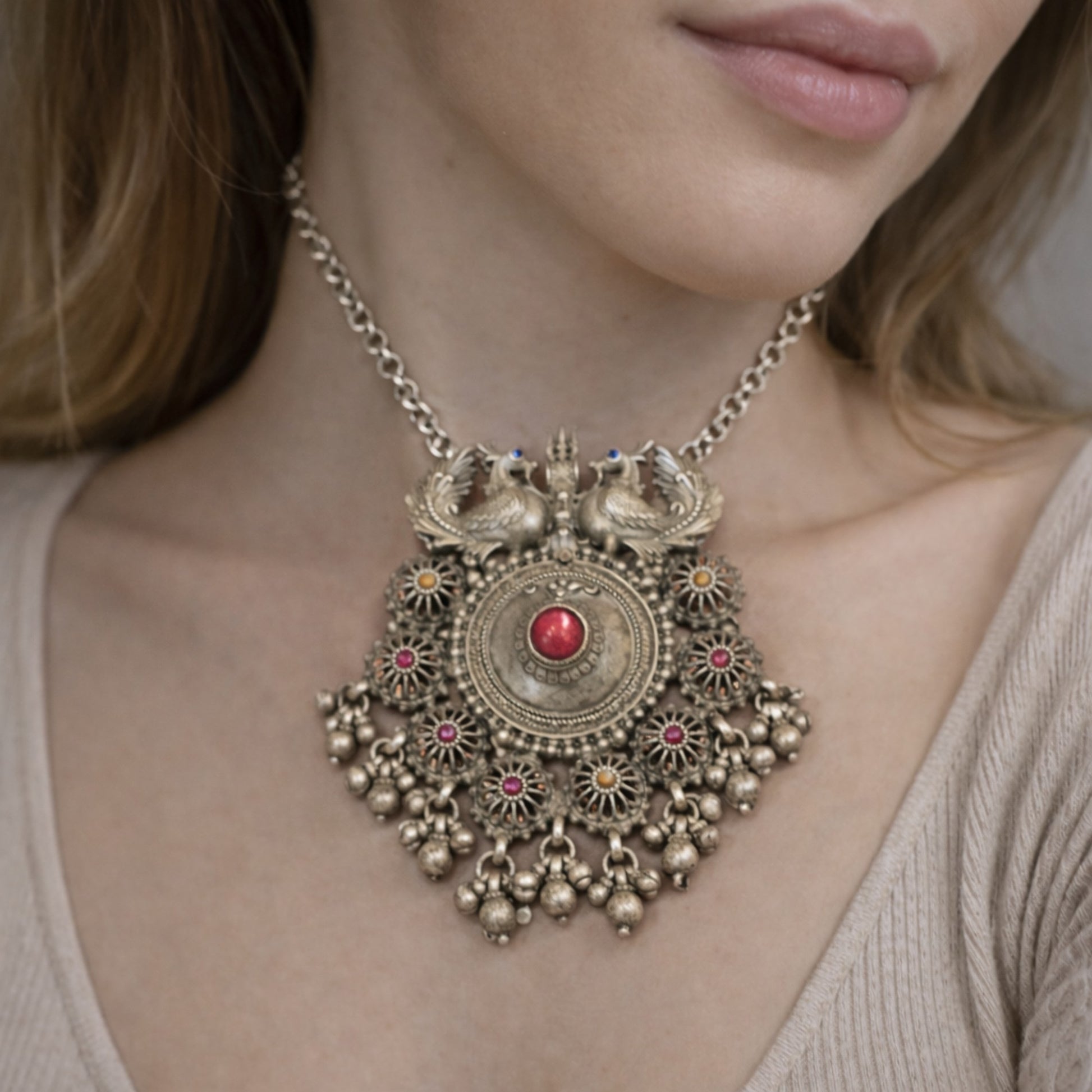 SILVER PENDANT WITH TWIN PEACOCK FIGURES