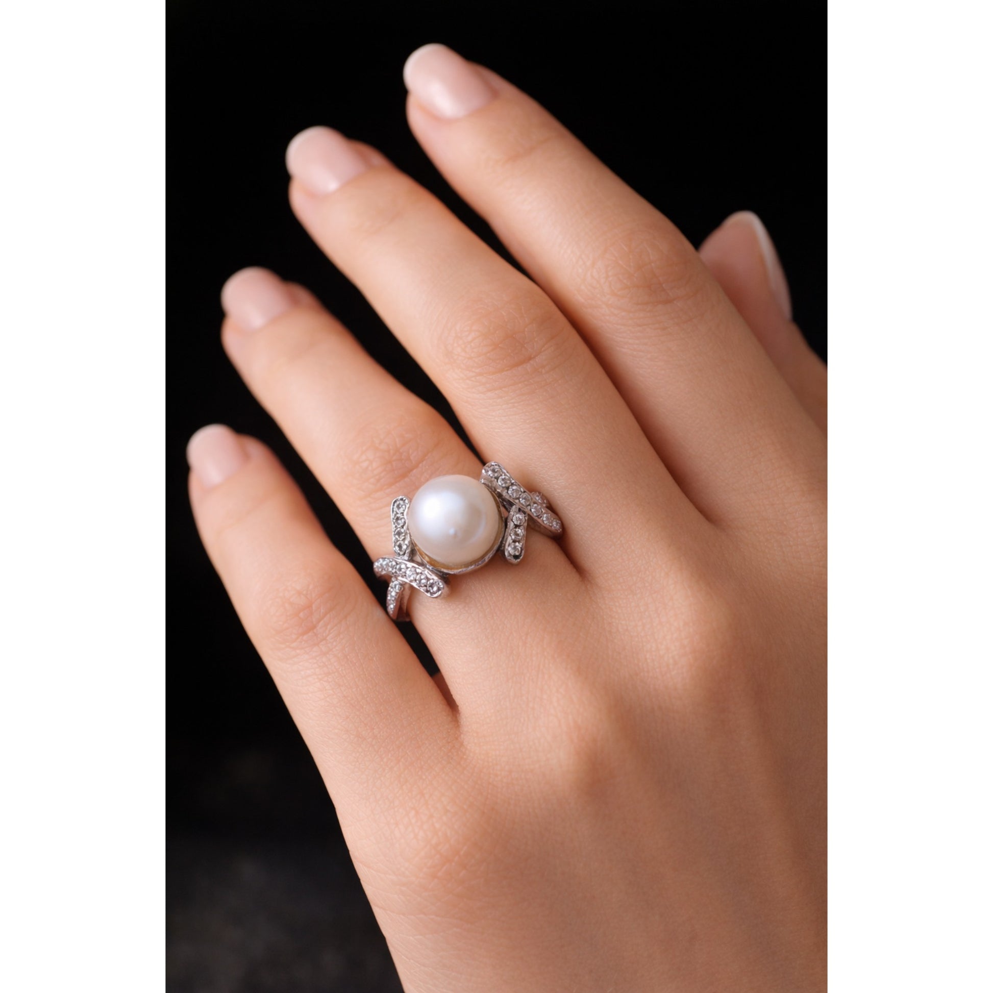 SILVER RING WITH CENTRAL PEARL AND ZIRCON