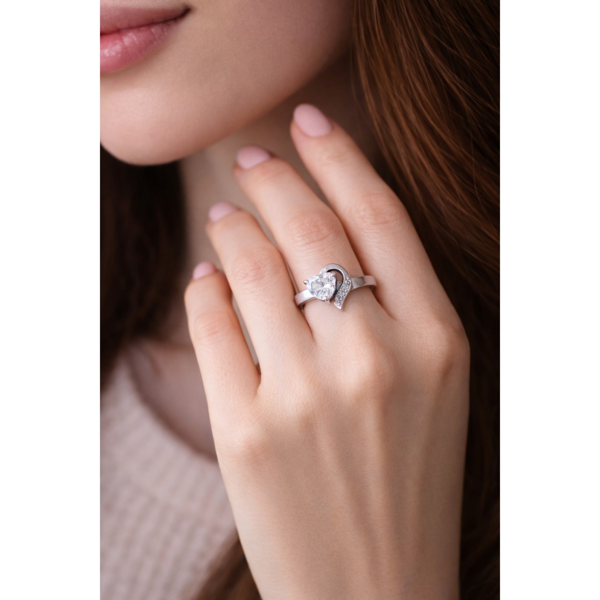 SILVER RING WITH A HEART SHAPED ZIRCON