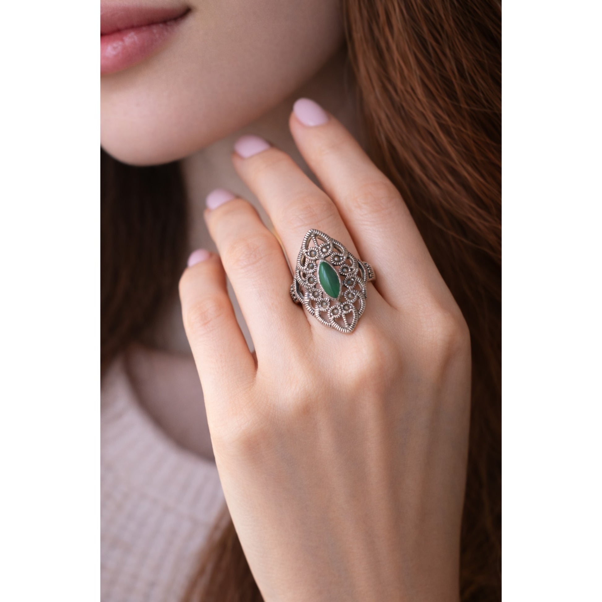 SILVER RING WITH A GREEN ONYX AND MARCASITE