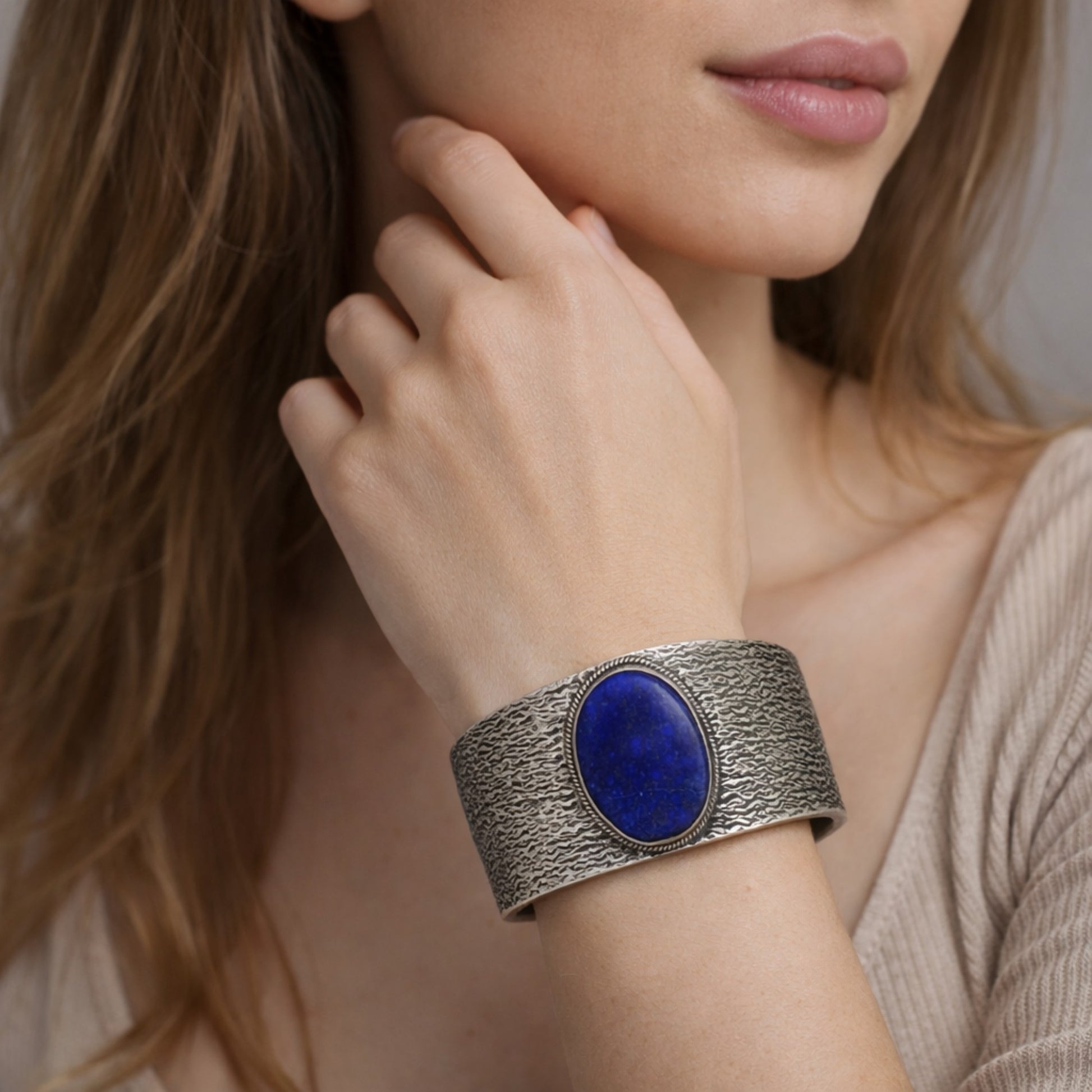 SILVER KADA FEATURING A LARGE ROUND LAPIS LAZULLI