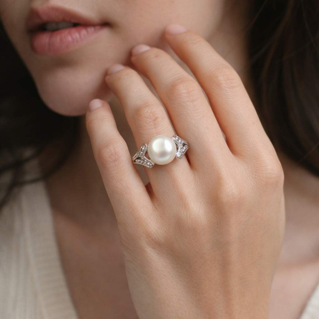 SILVER RING STUDDED WITH ZIRCON AND NATURAL PEARL