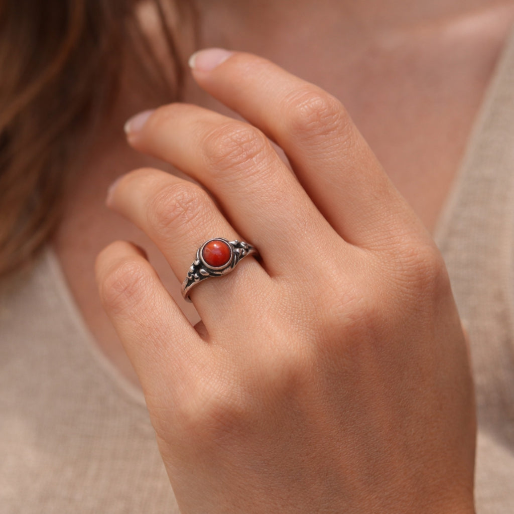 SILVER RING STUDDED WITH CORAL