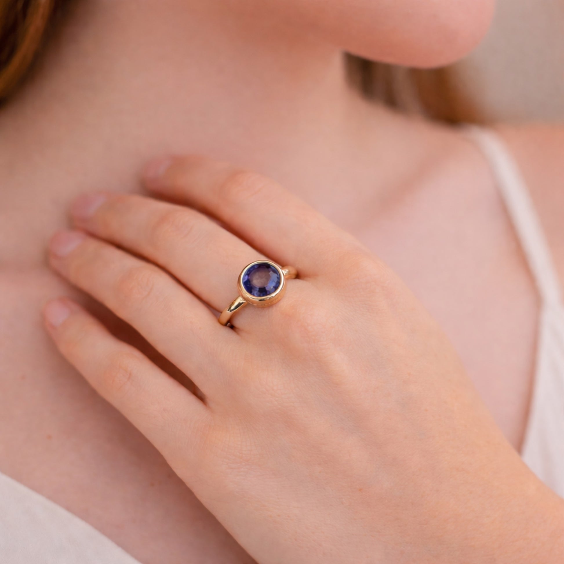 SILVER RING STUDDED WITH TANZANITE