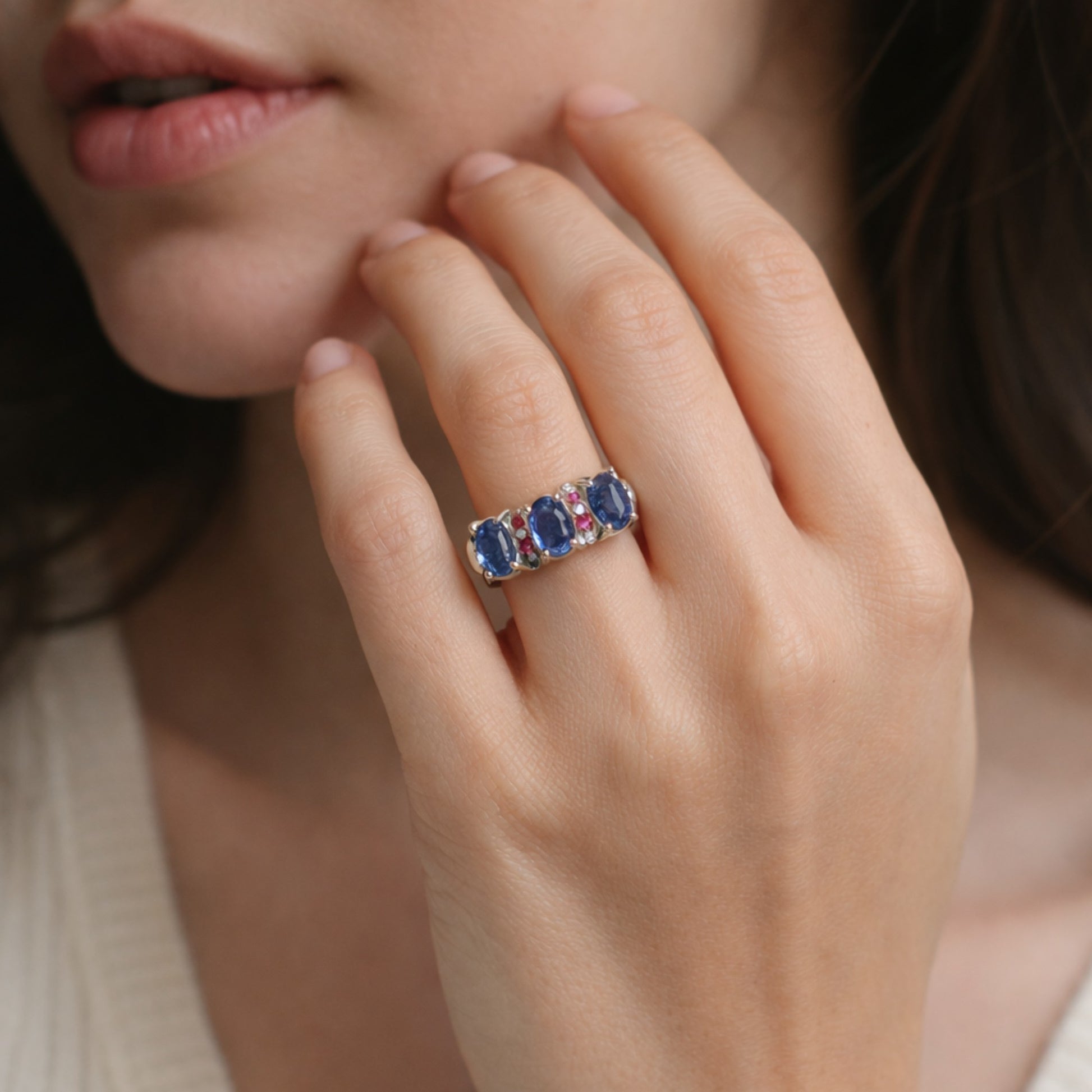SILVER RING STUDDED WITH RUBIES AND TANZANITE