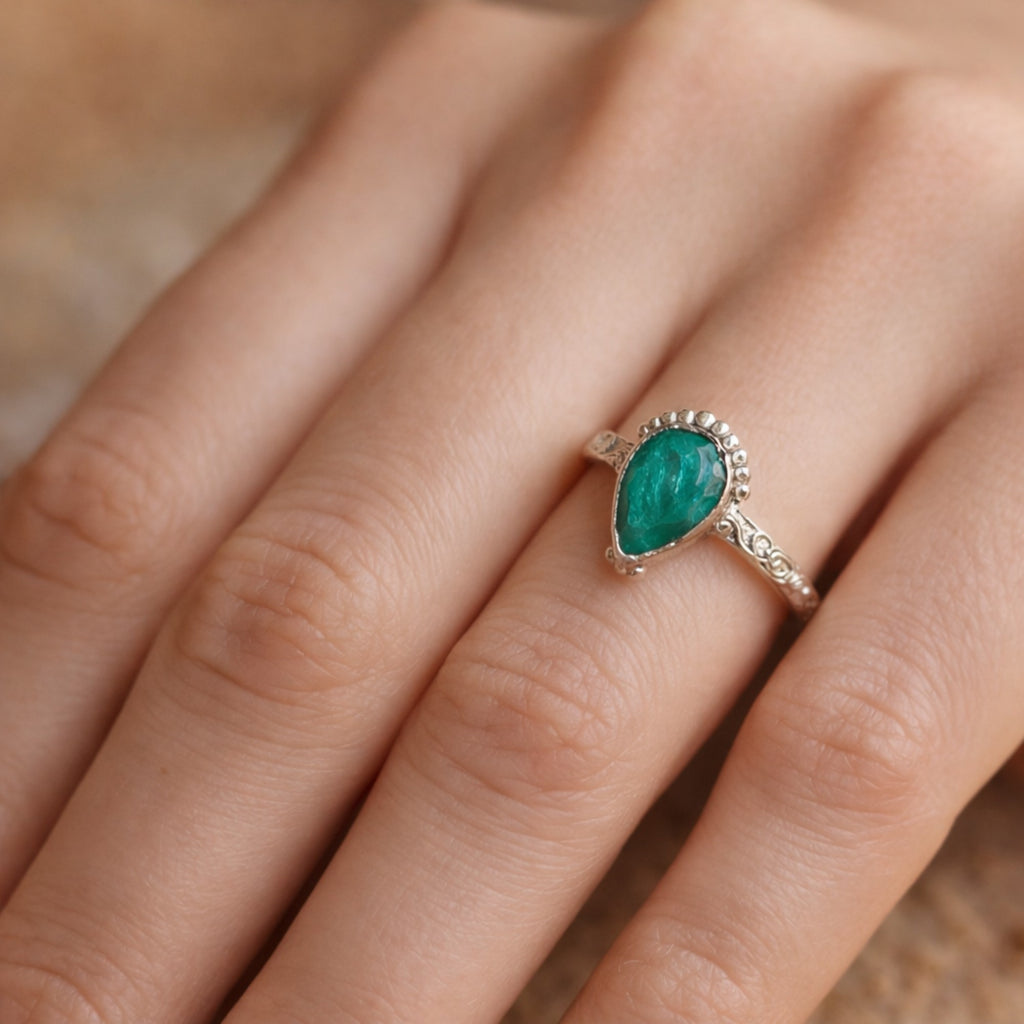 SILVER RING STUDDED WITH TEARDROP INDIAN EMERALD