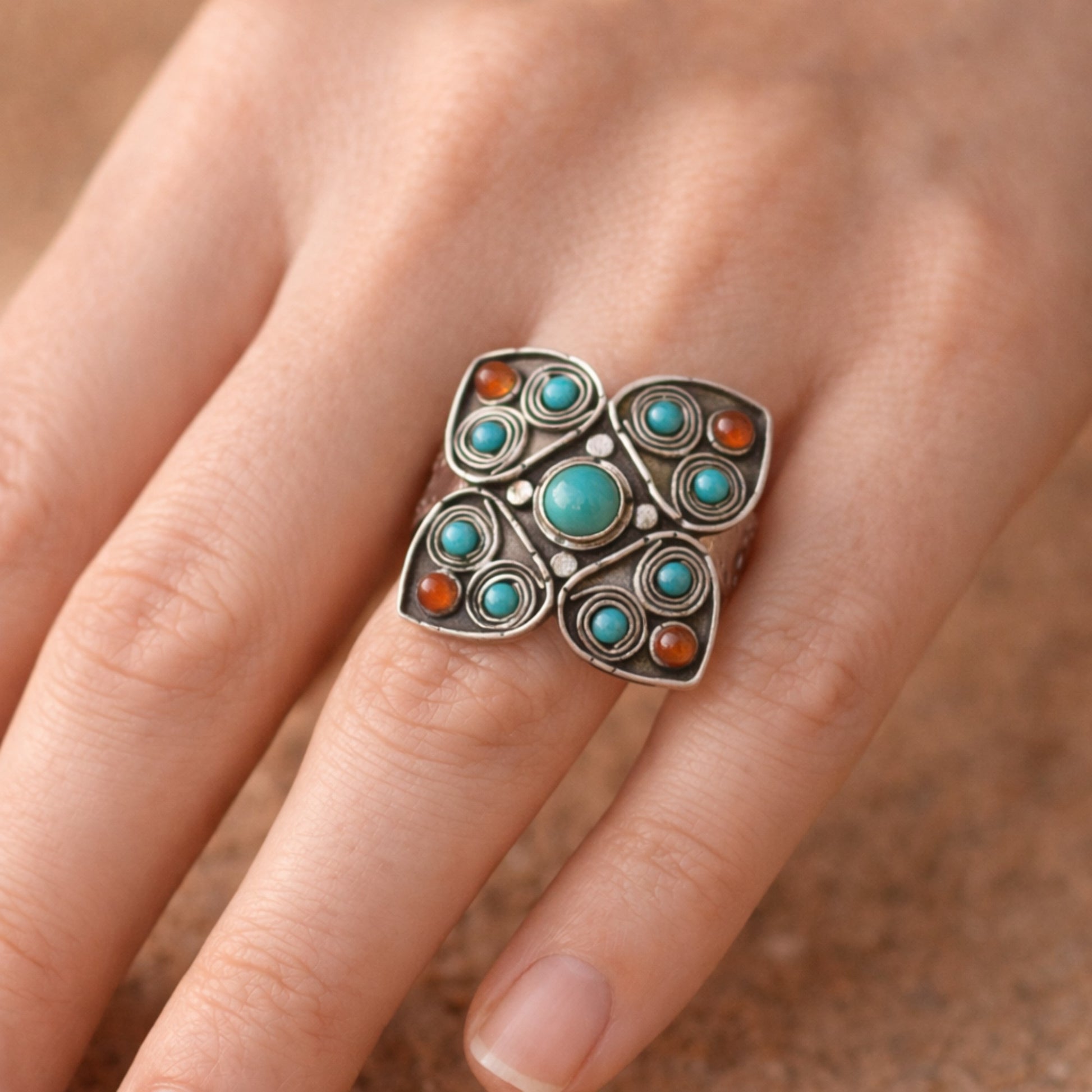 VINTAGE SILVER RING WITH TURQUOISES AND AGATES IN A SPIRAL SETTING