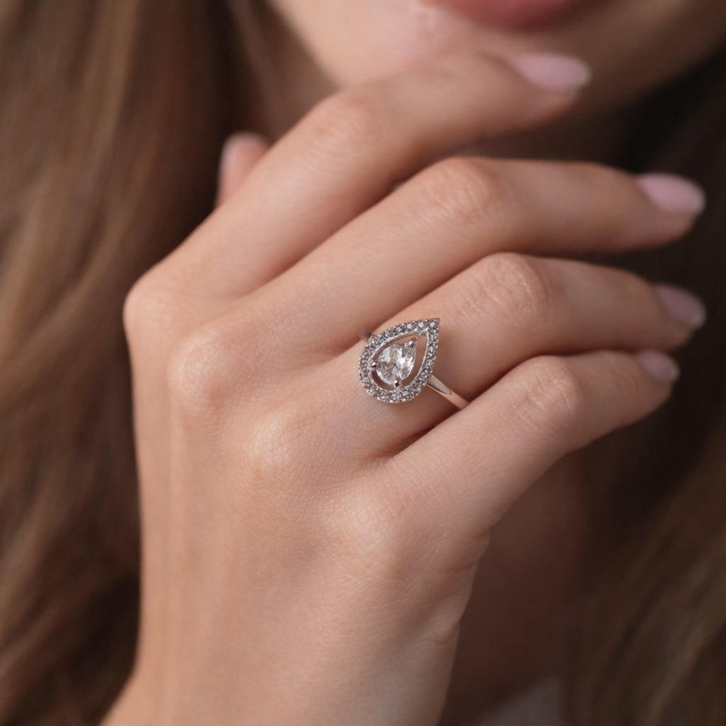 TEARDROP SHAPED ZIRCON RING WITH HALO SETTING
