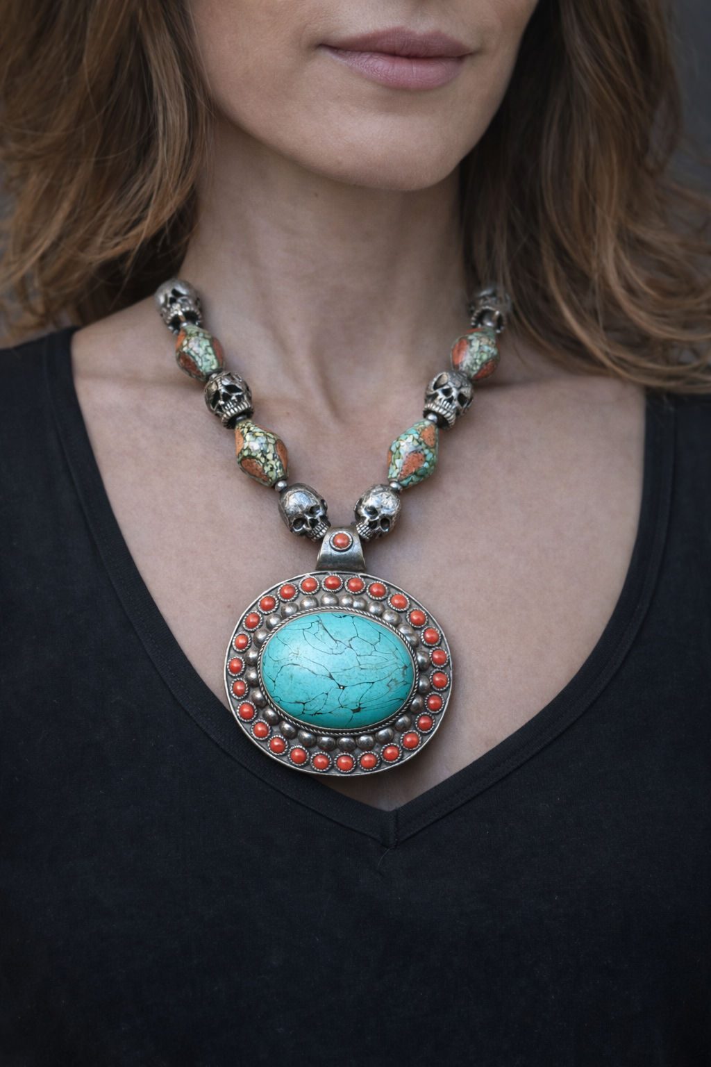 TRIBAL NECKLACE WITH TURQUOISE AND CORAL BEEDS , FEATURING A LARGE TURQUOISE PENDANT
