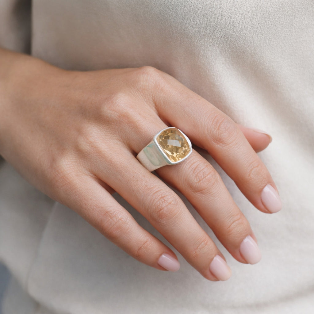 SILVER RING WITH A GOLDEN TOPAZ