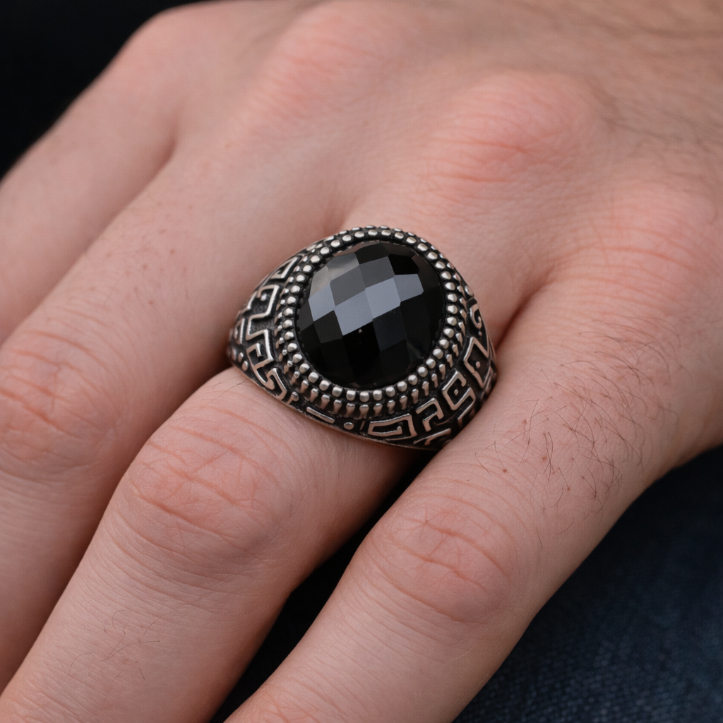 ANTIQUE SILVER RING WITH A BLACK ONYX STONE