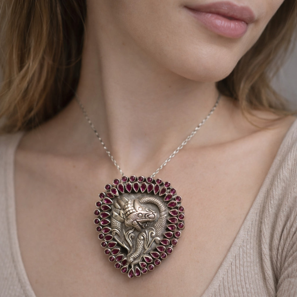 SILVER TWIN FISH PENDANT WITH BANGOK RUBY STONES