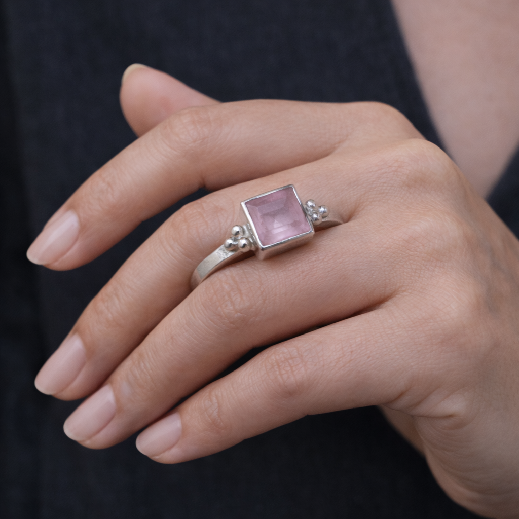 SILVER RING ADORNED WITH A BOLD SQUARE CUT PINK GEMSTONE