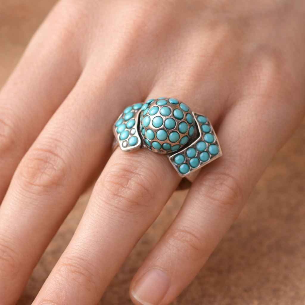 CHUNKY SILVER RING ADORNED WITH TURQUOISES