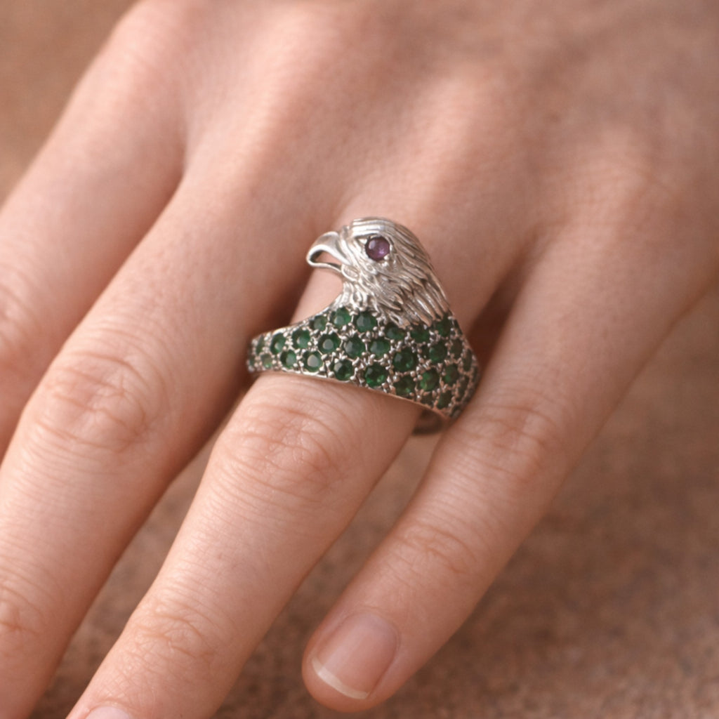 SILVER EAGLE SHAPED RING WITH EMERALDS & A SMALL RUBY EYE