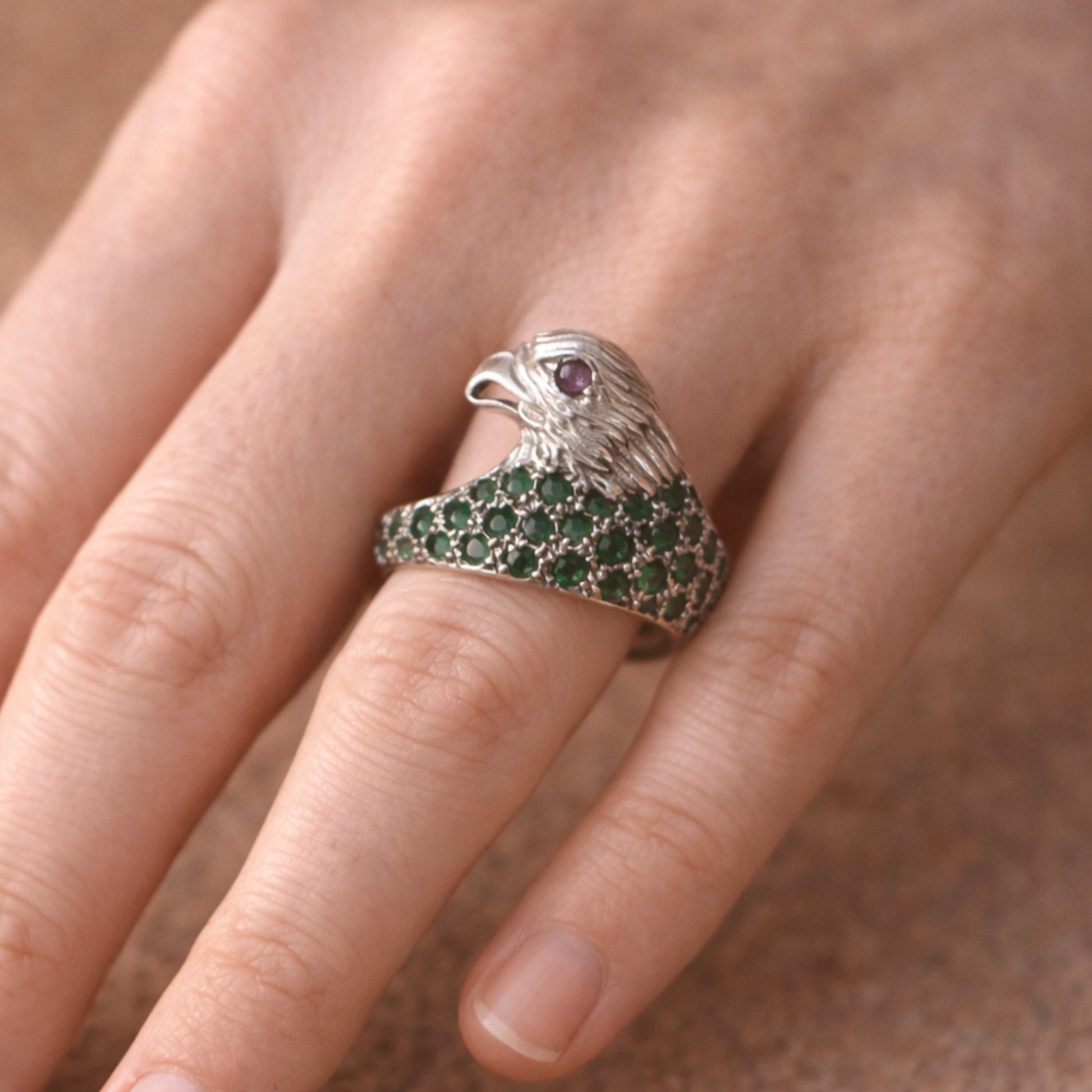 SILVER EAGLE SHAPED RING WITH EMERALDS & A SMALL RUBY EYE