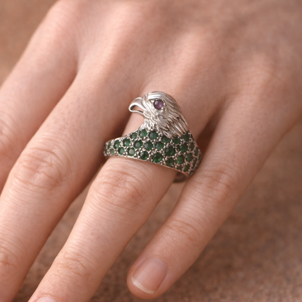 SILVER EAGLE SHAPED RING WITH EMERALDS & A SMALL RUBY EYE