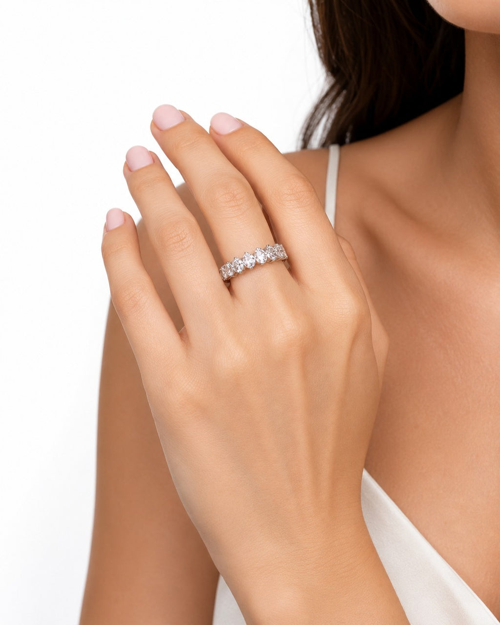 SILVER RING WITH A ROW OF MARQUISE CUT ZIRCONS