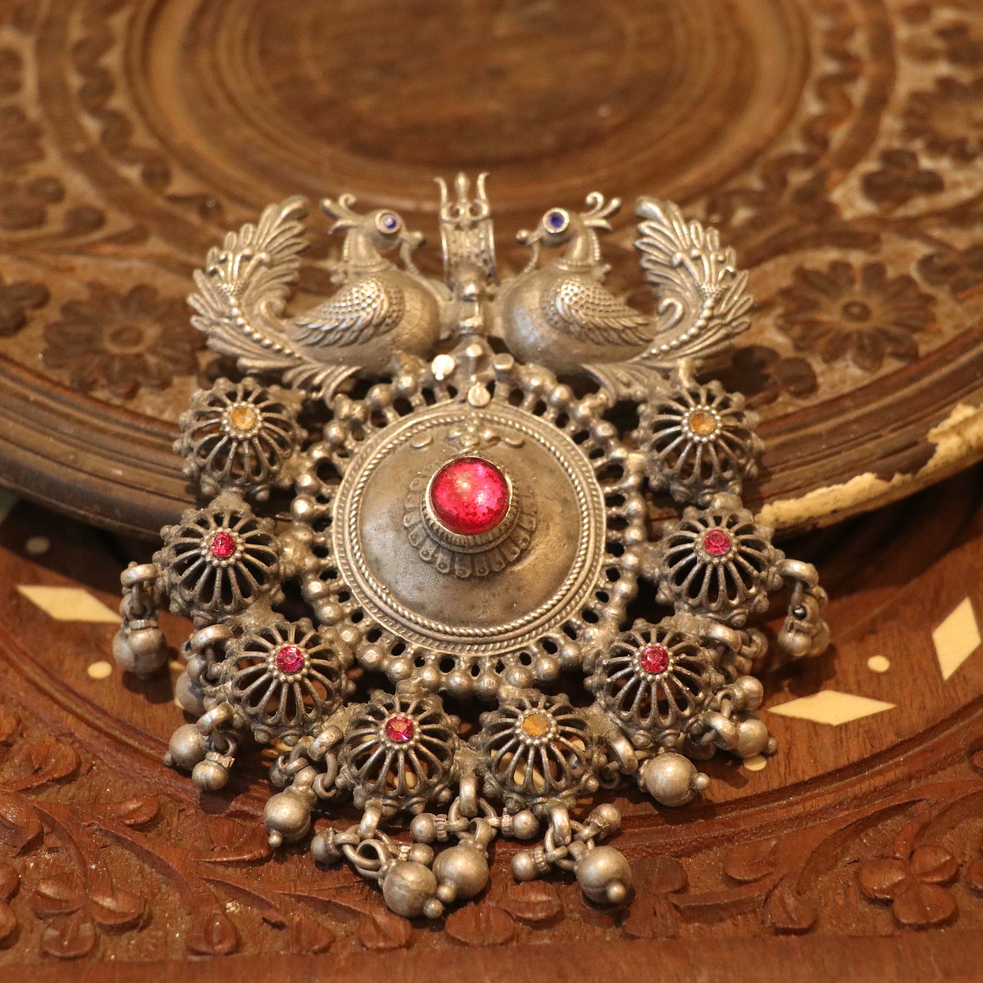 SILVER PENDANT WITH TWIN PEACOCK FIGURES