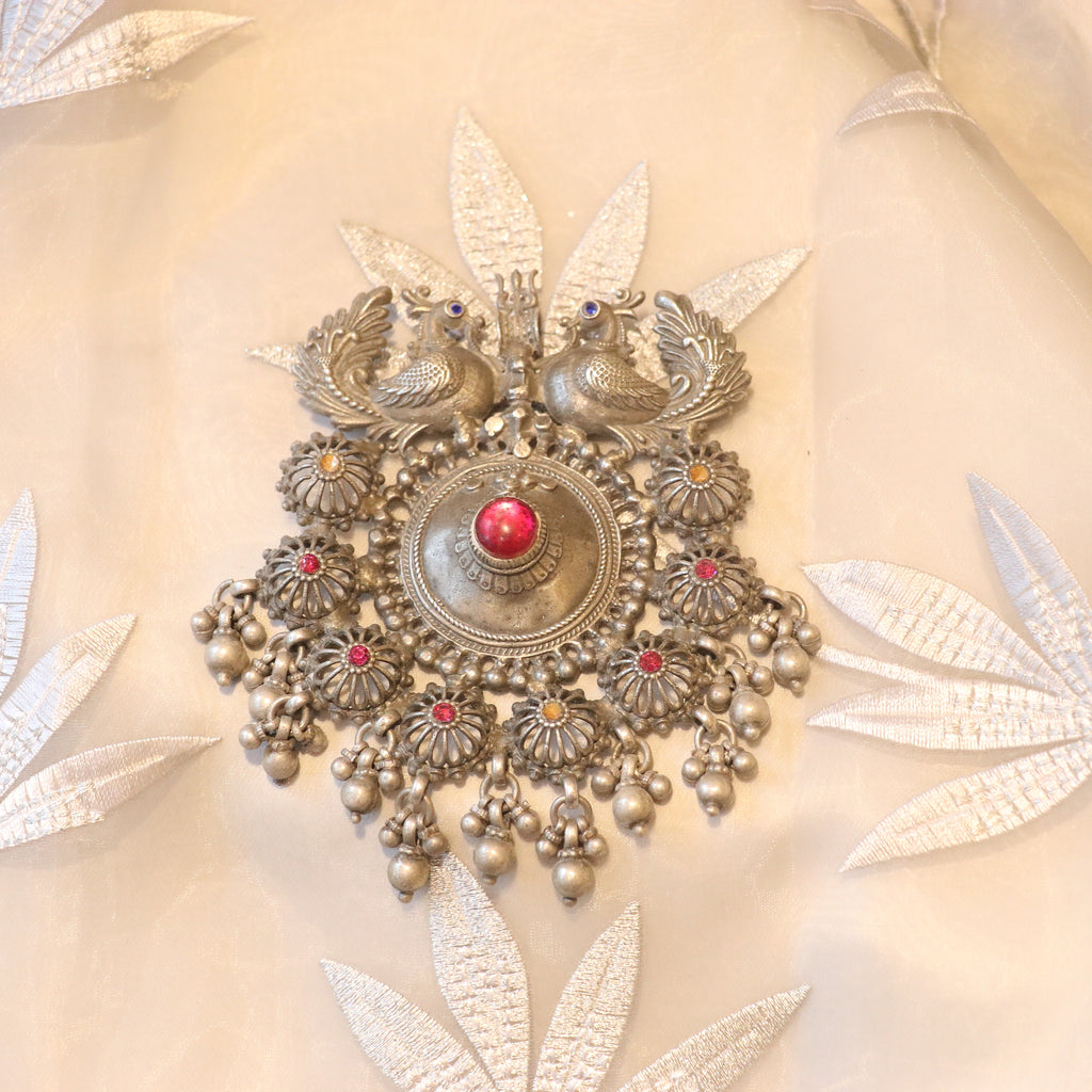 SILVER PENDANT WITH TWIN PEACOCK FIGURES