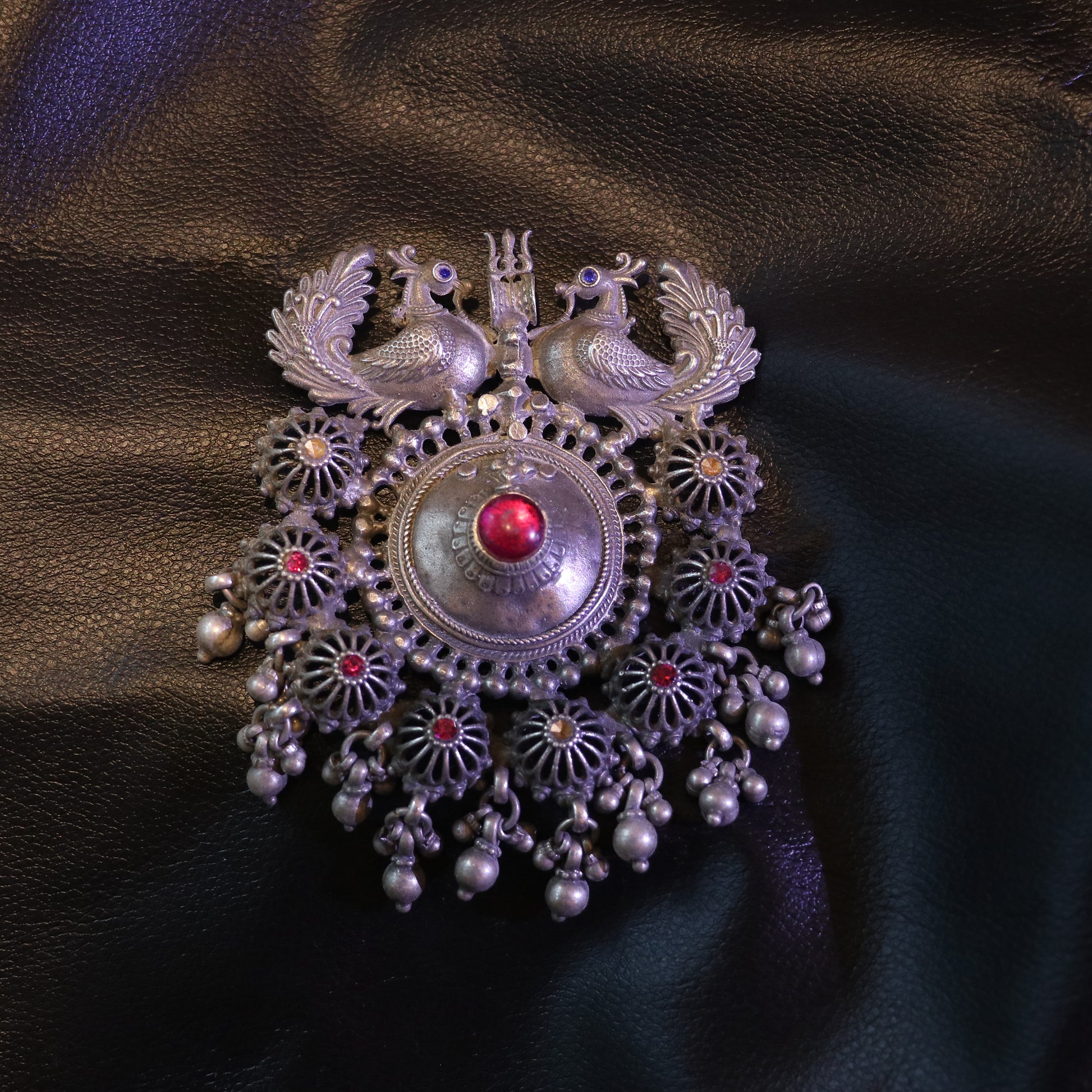 SILVER PENDANT WITH TWIN PEACOCK FIGURES