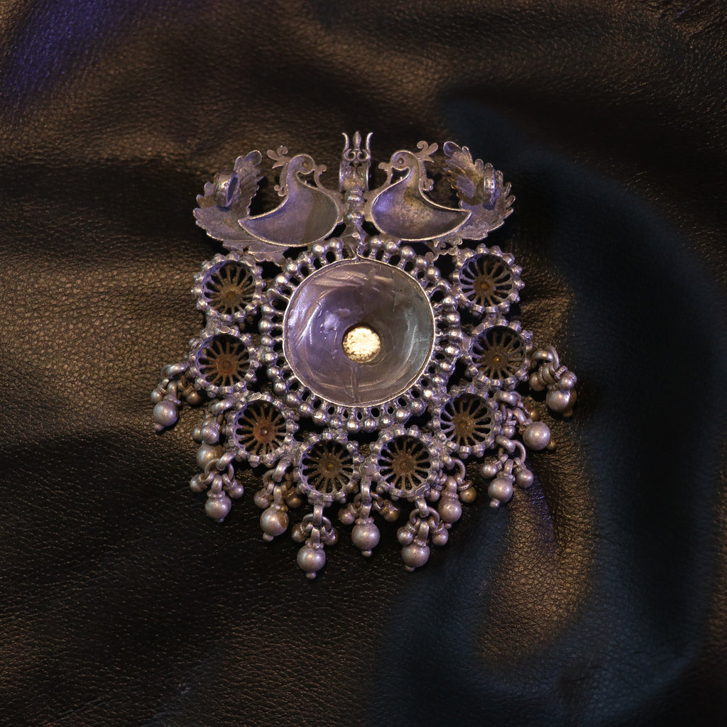 SILVER PENDANT WITH TWIN PEACOCK FIGURES