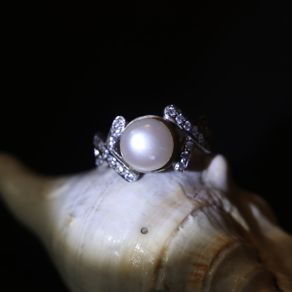 SILVER RING WITH CENTRAL PEARL AND ZIRCON