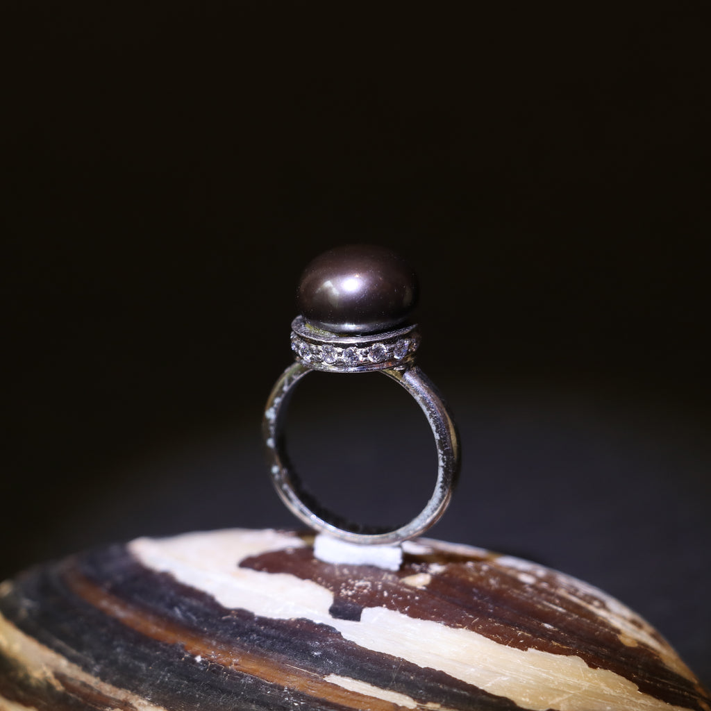 SILVER RING WITH BLACK PEARL AND ZIRCON