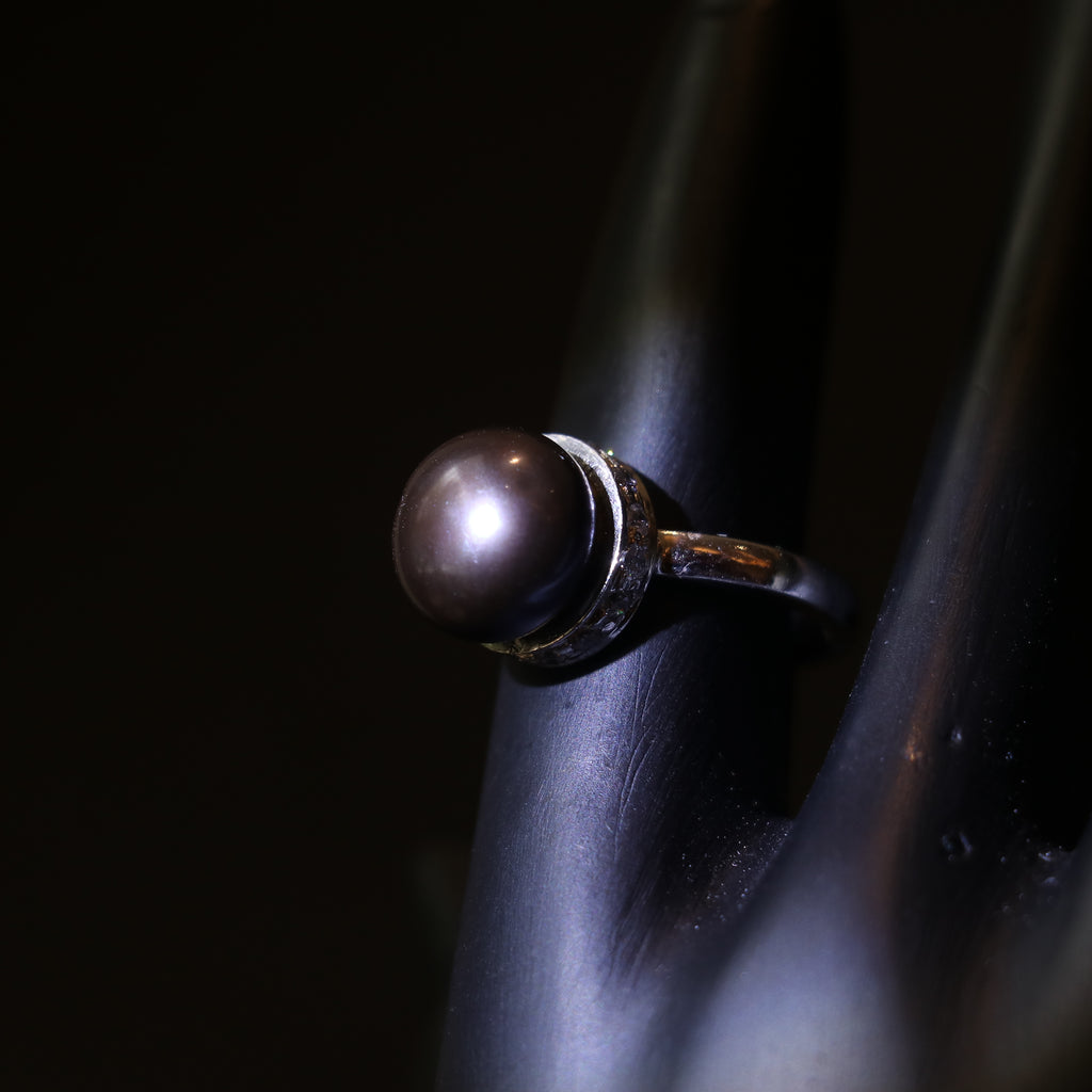 SILVER RING WITH BLACK PEARL AND ZIRCON