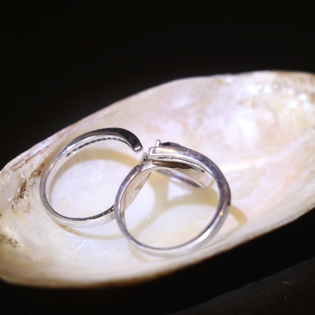 SILVER RING WITH TEARDROP HALO AND BLUE STONE