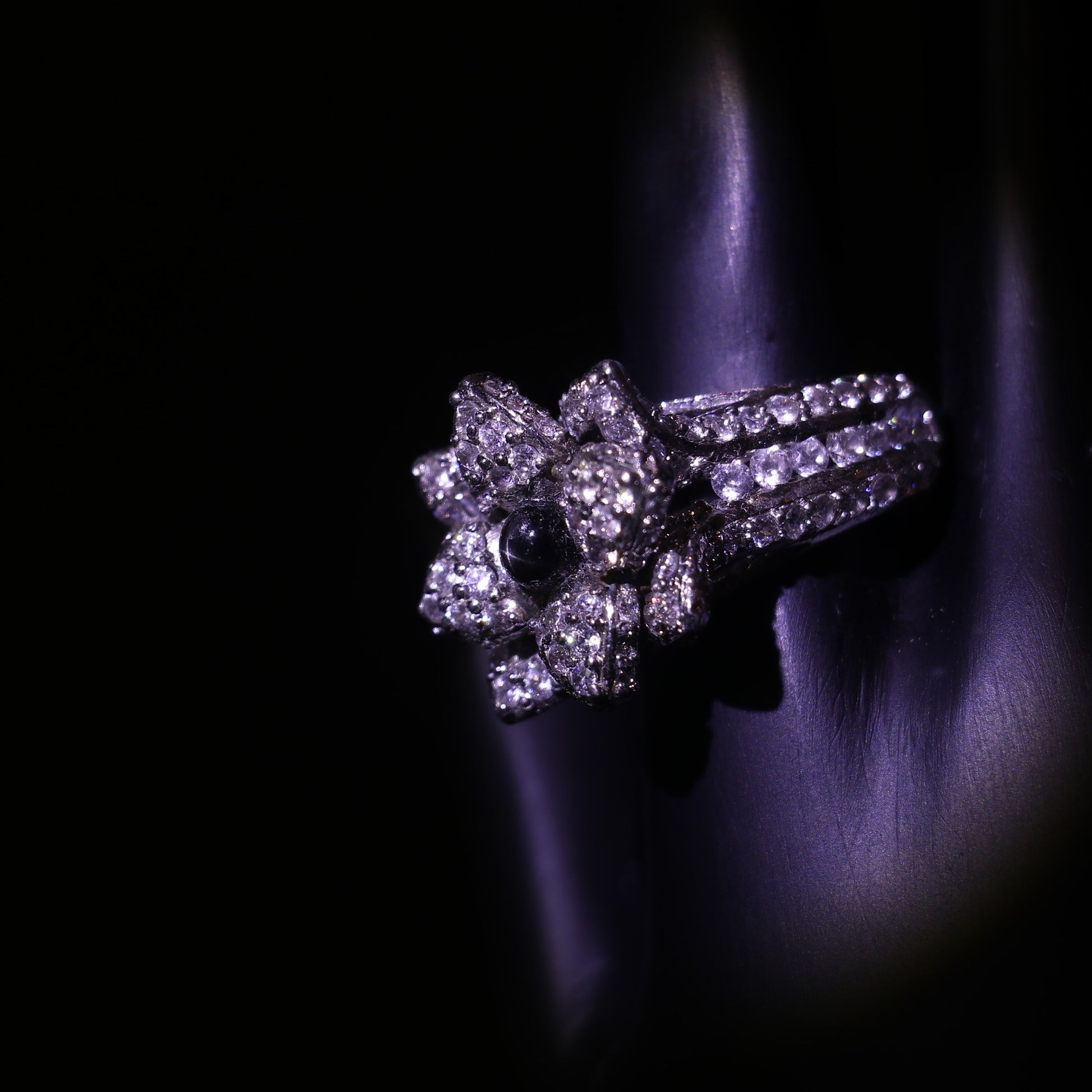 SILVER FLORAL RING WITH ZIRCON ACCENTS