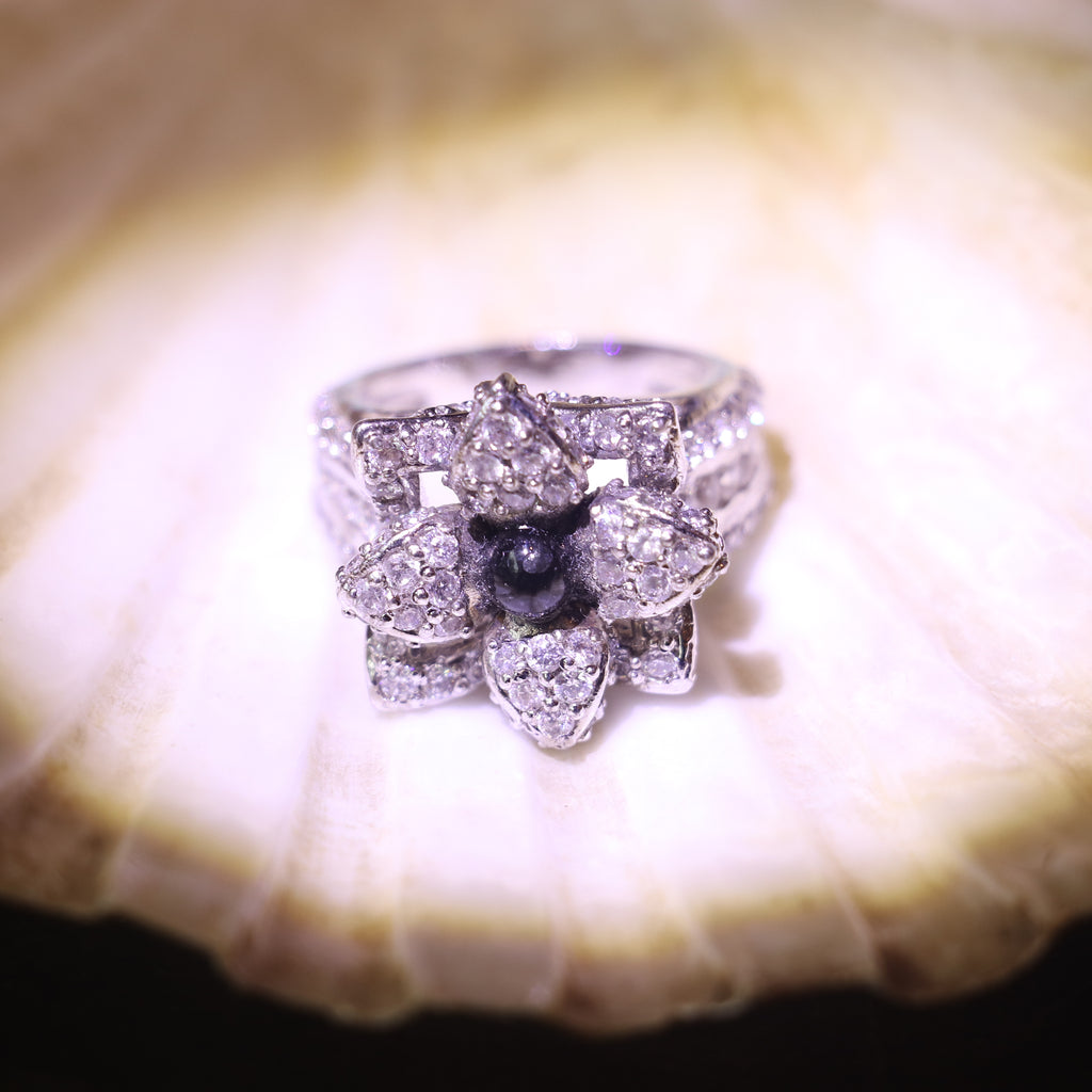 SILVER FLORAL RING WITH ZIRCON ACCENTS