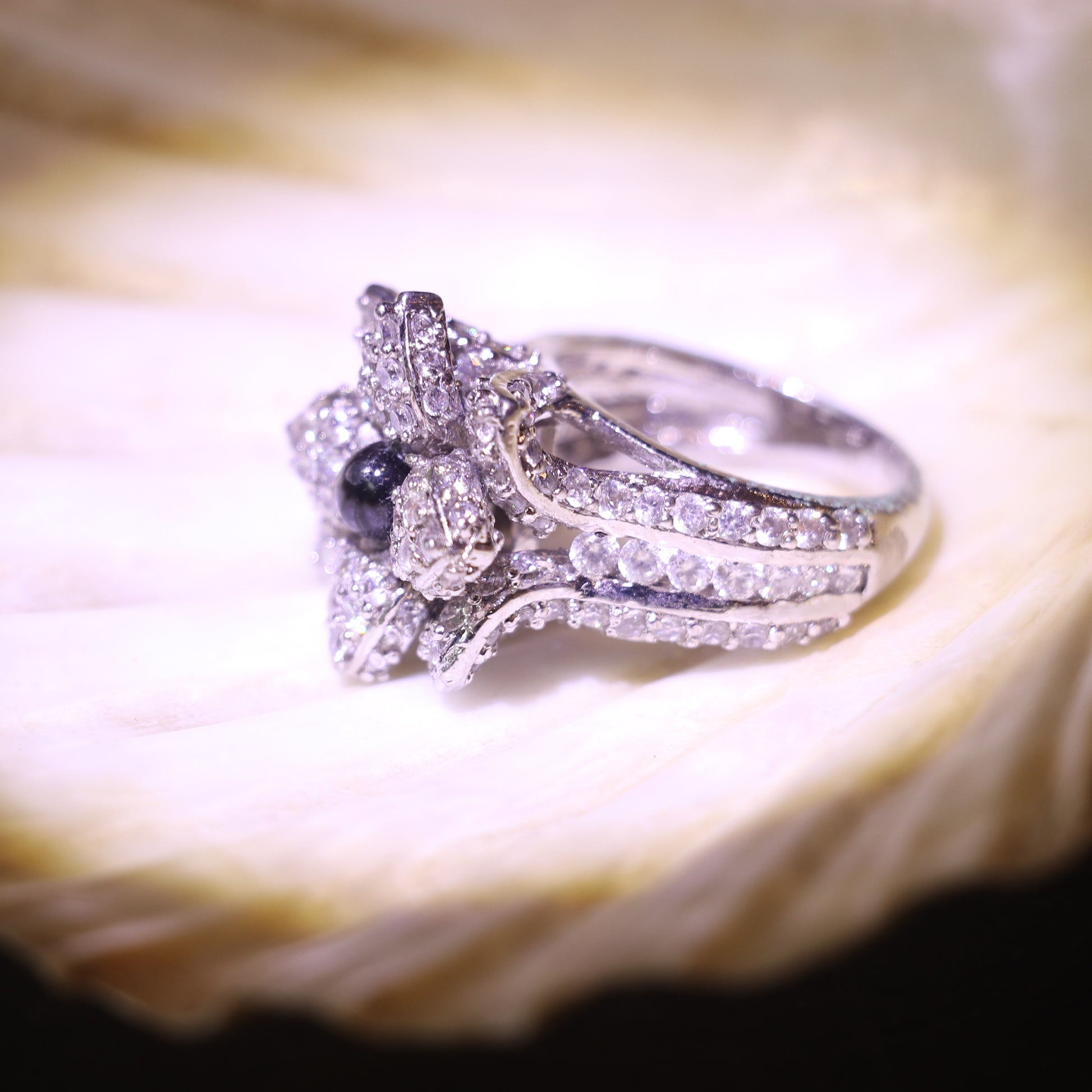 SILVER FLORAL RING WITH ZIRCON ACCENTS