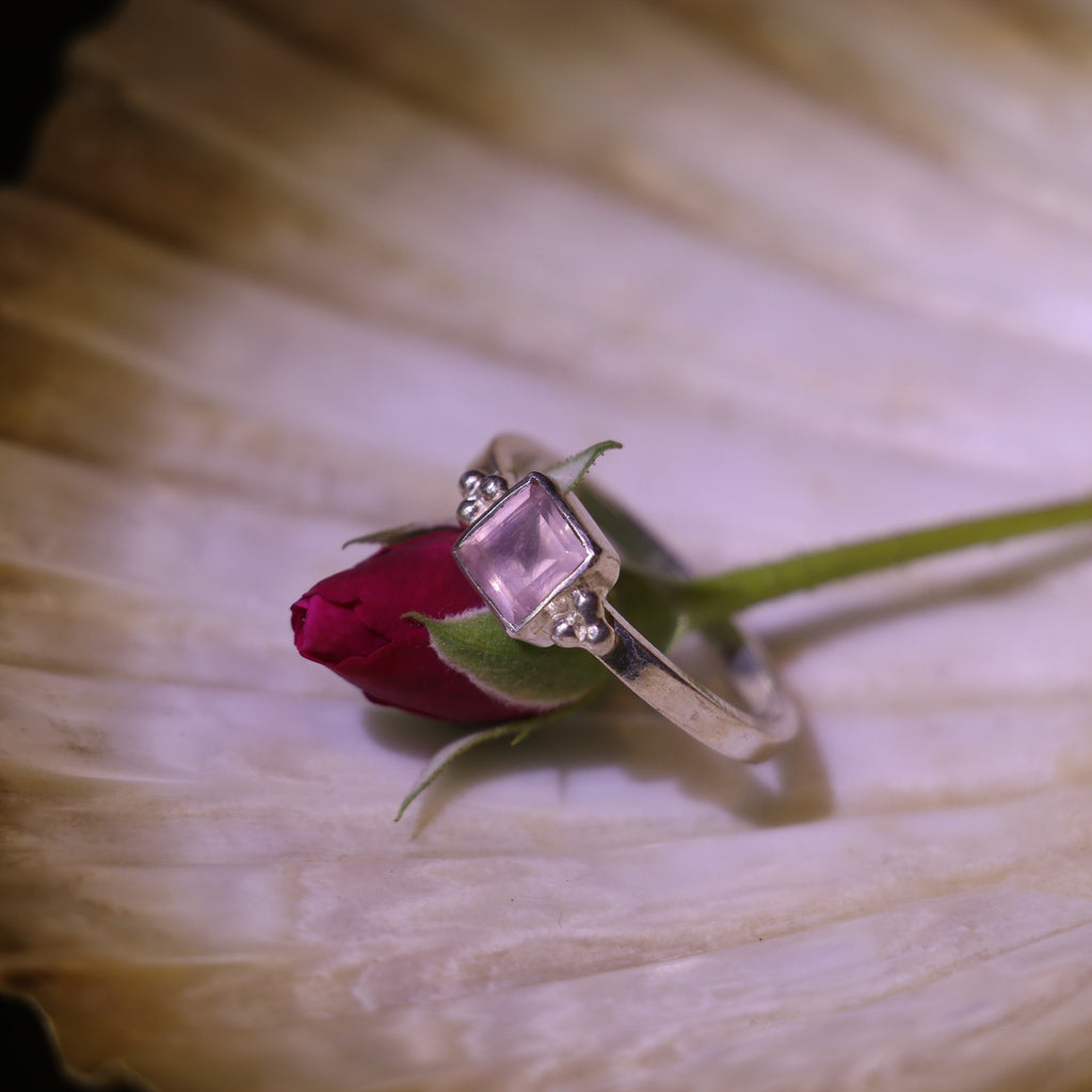 SILVER RING ADORNED WITH A BOLD SQUARE CUT PINK GEMSTONE