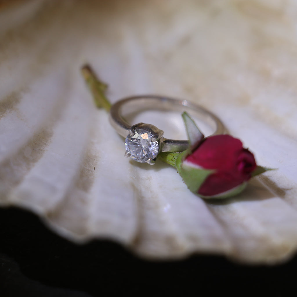 PLAIN SILVER BAND WITH A BIG ROUND ZIRCON