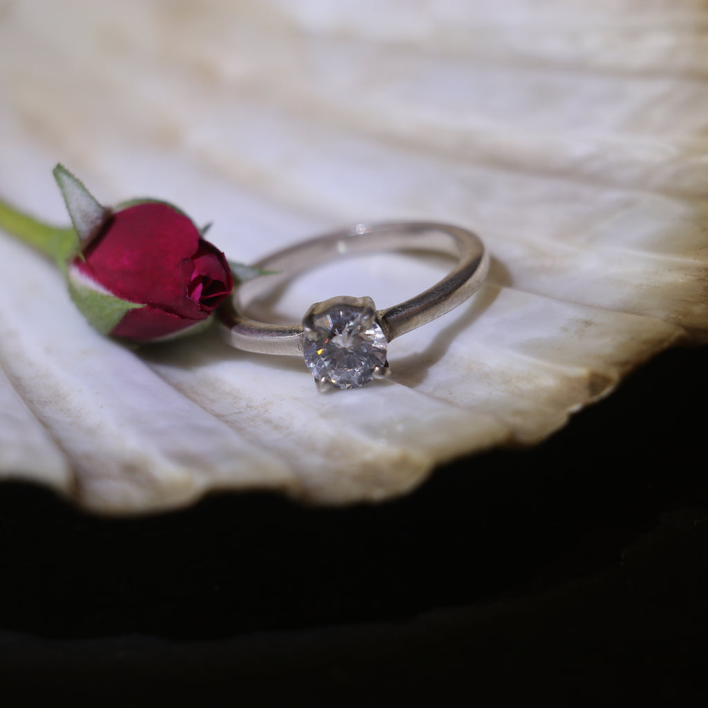 PLAIN SILVER BAND WITH A BIG ROUND ZIRCON