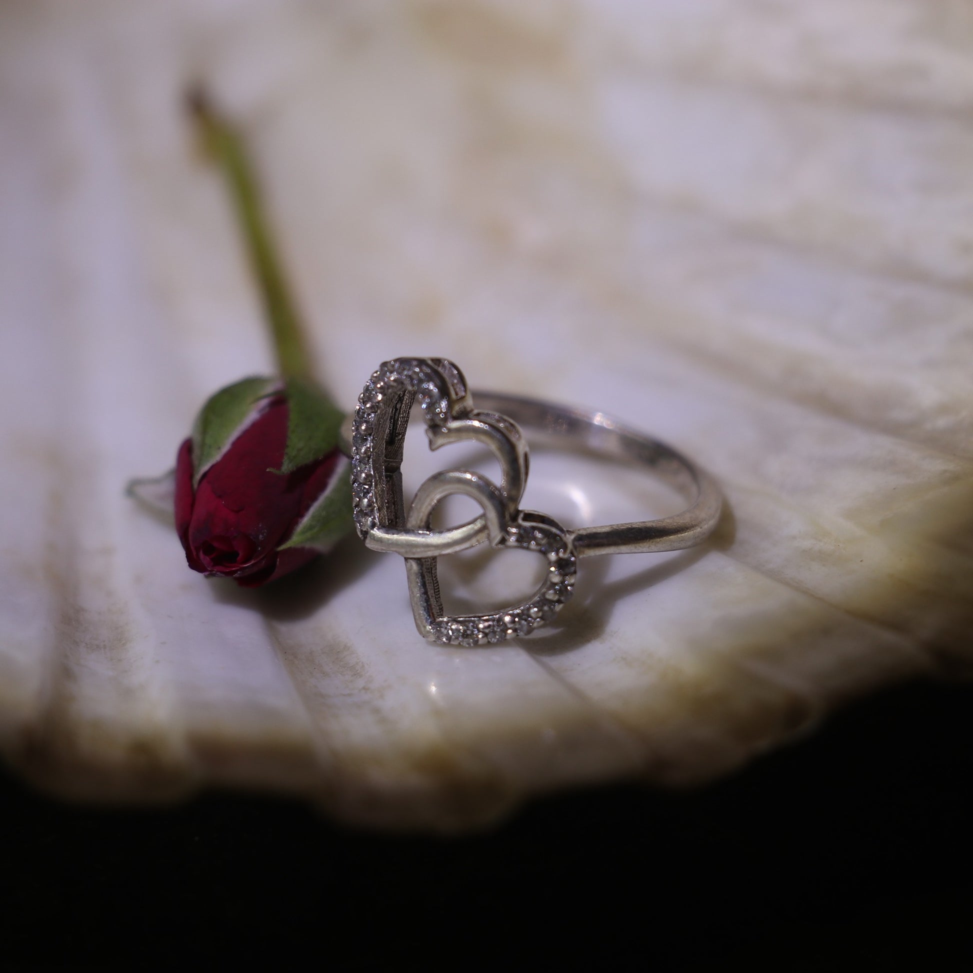 SILVER RING WITH DOUBLE HEART DESIGN AND SMALL ZIRCONS
