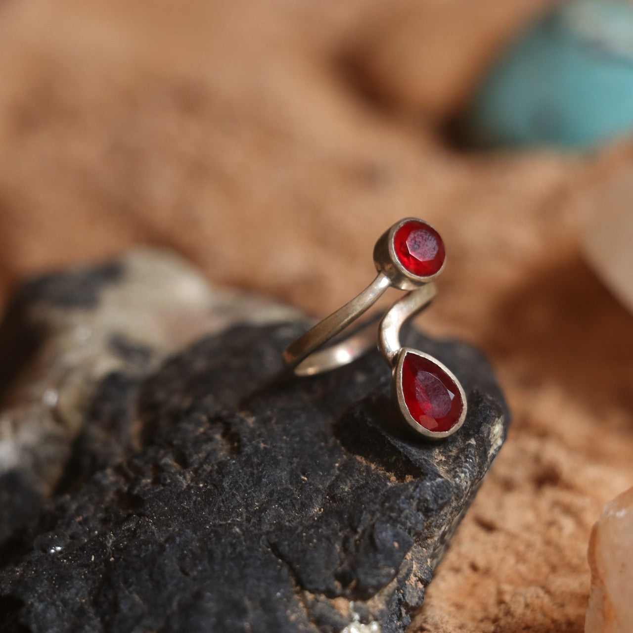 SILVER OPEN RING WITH RUBIES