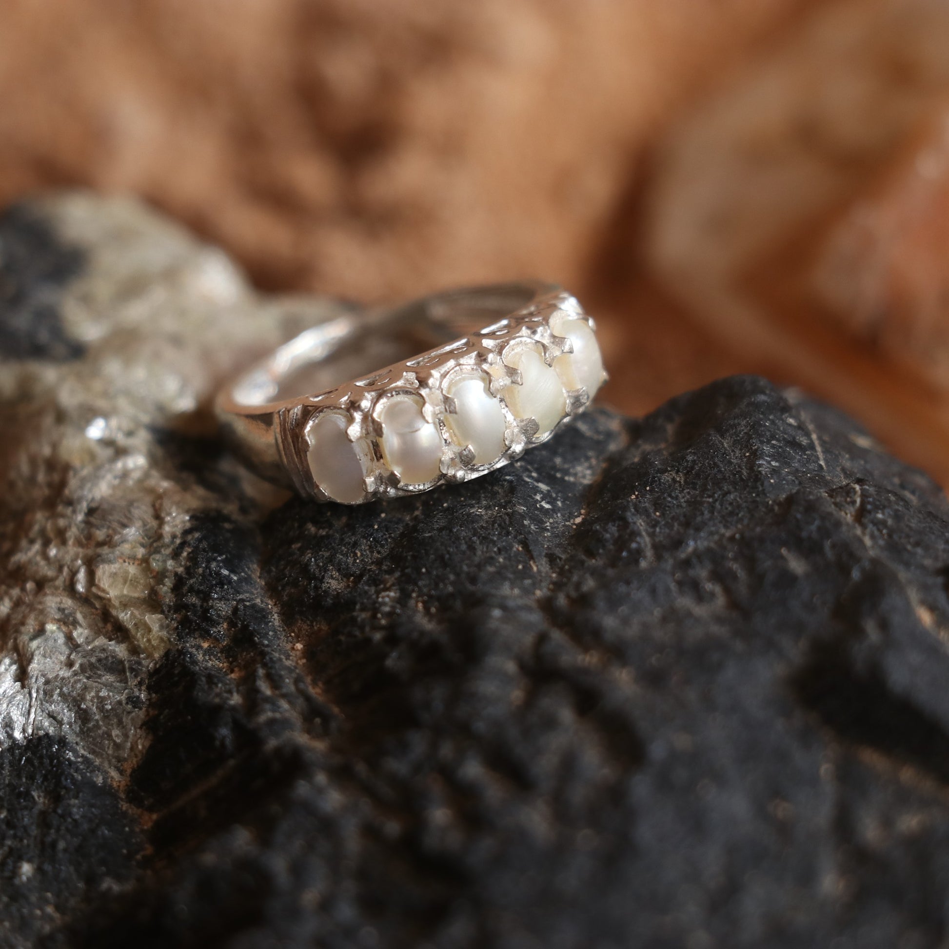 SILVER BAND STUDDED WITH NATURAL PEARLS