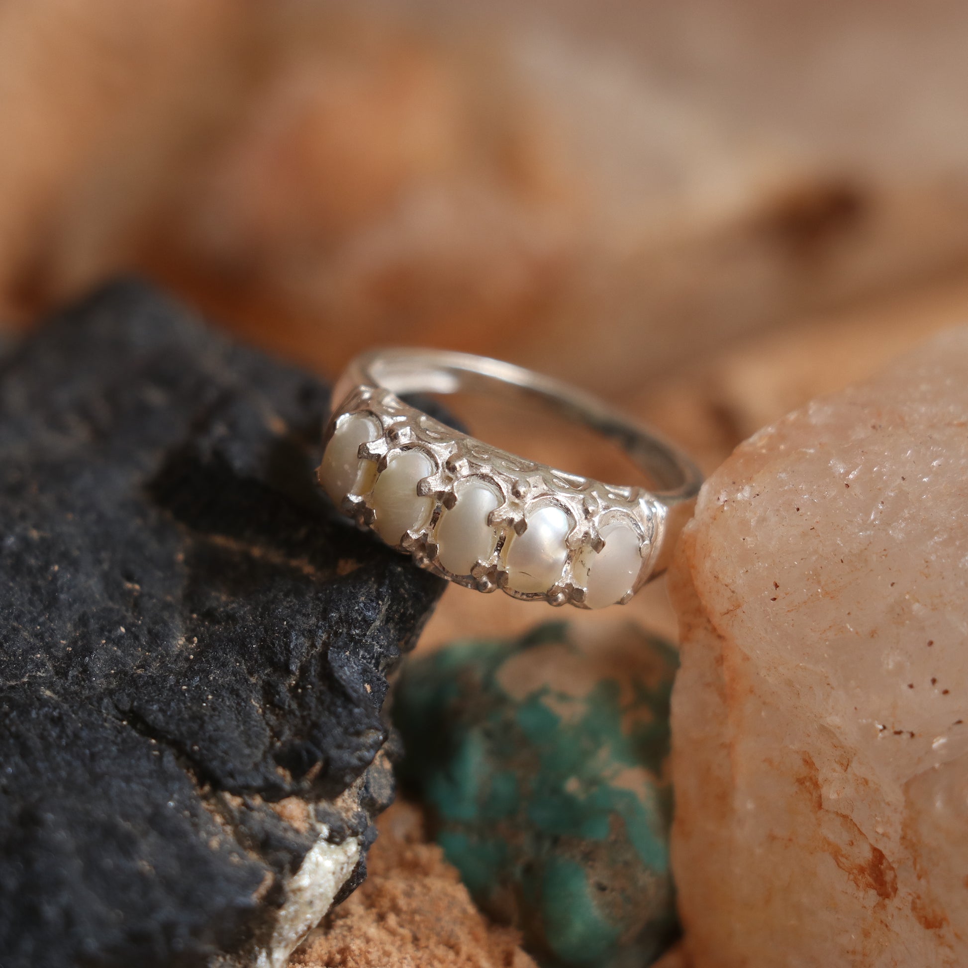 SILVER BAND STUDDED WITH NATURAL PEARLS