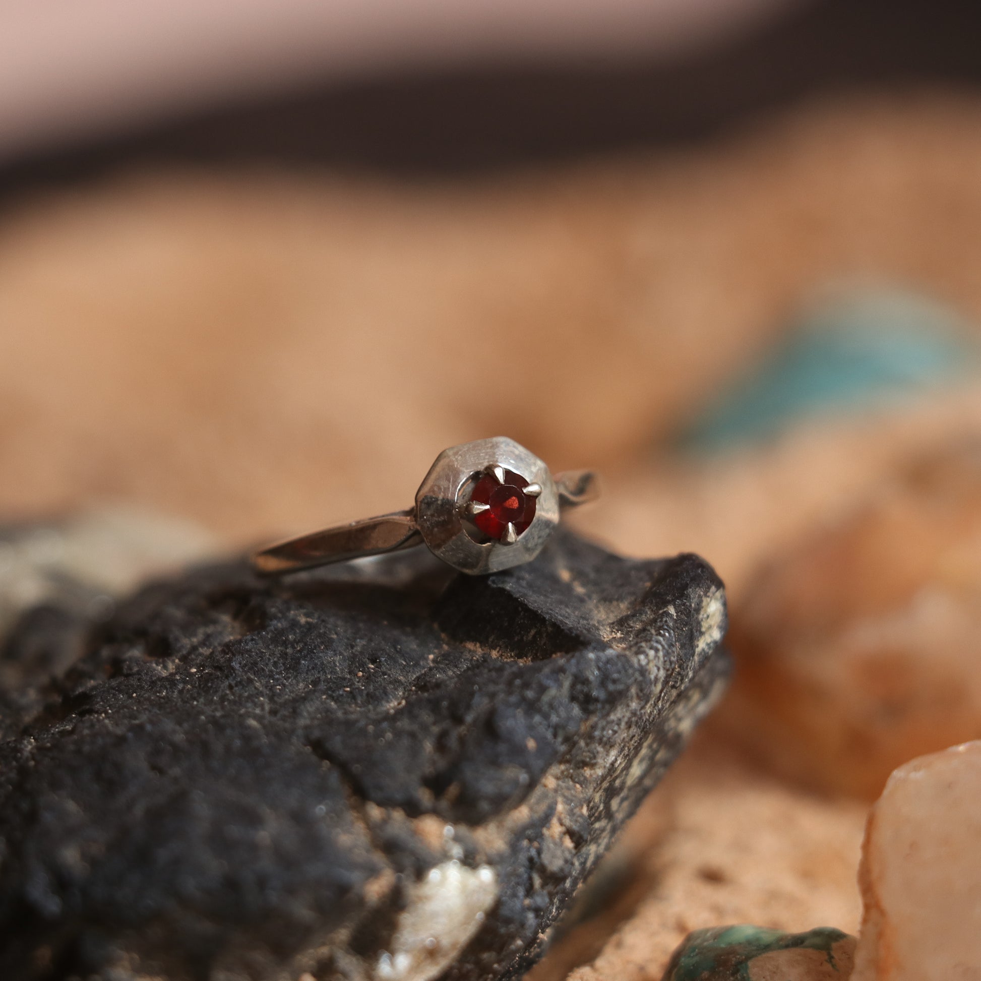 SILVER RING STUDDED WITH GARNET
