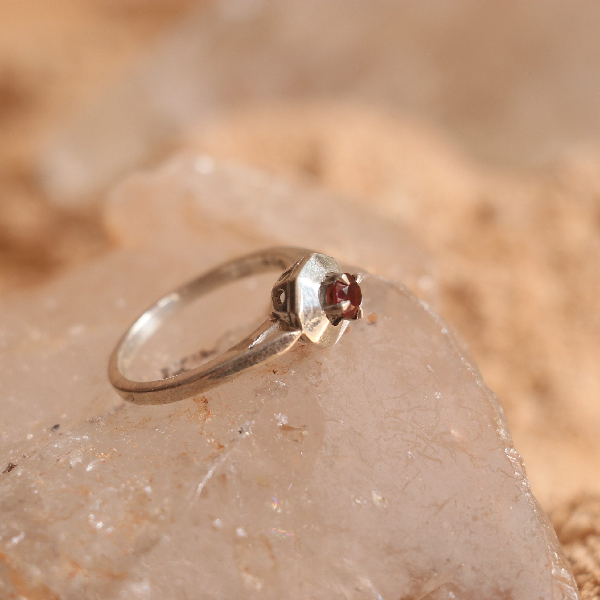 SILVER RING STUDDED WITH GARNET