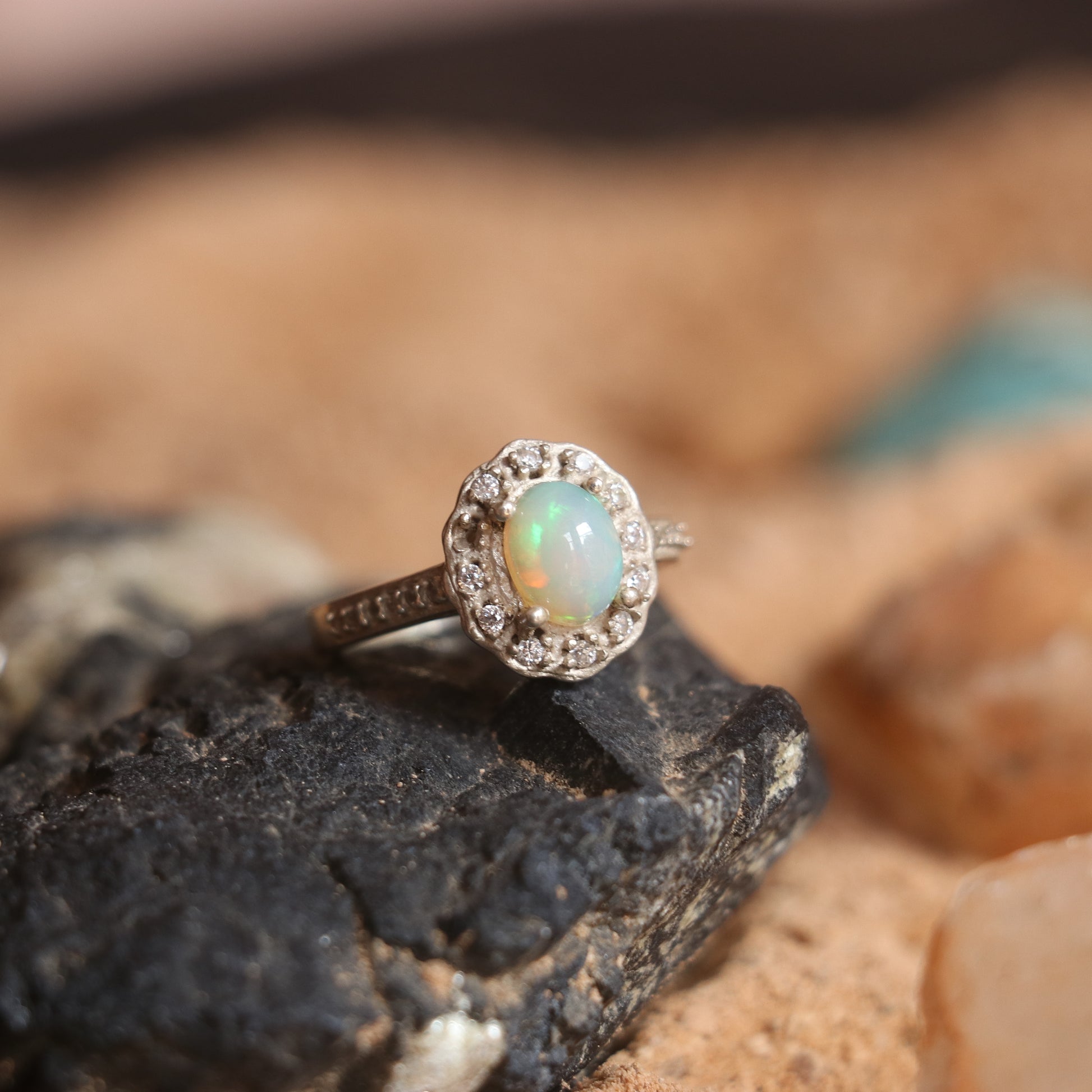 SILVER RING STUDDED WITH ZIRCON AND NATURAL ETHIOPIAN OPAL